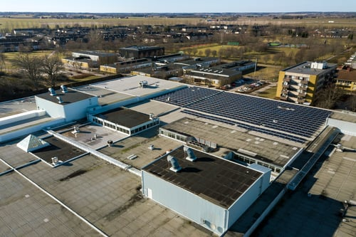 What Commercial Property Owners Should Know About Flat Roof Replacement